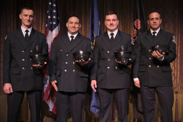 CG25_FD Graduation 52 Goshen Fire Department Recruit Academy graduates Charles Holderbaum, Brian Guerra, Jeffery Gill and Ryan Rentfrom pose after a ceremony on Wednesday, April 2, 2025 at the Goshen Theater. (Photo credit: James Korn | Eyedart)