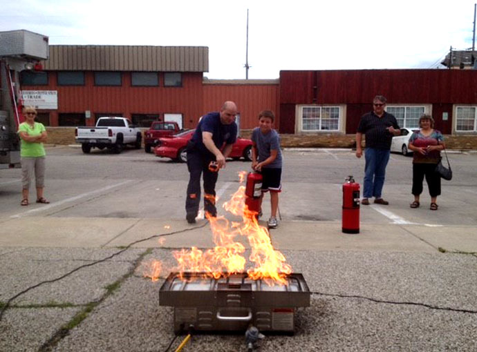 A teaching moment for using an extinguisher to put out a grill fire