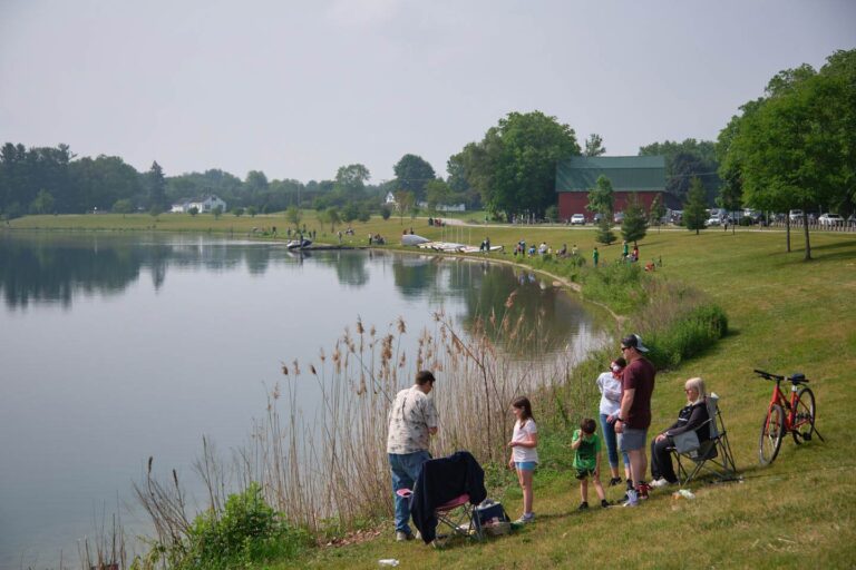 A wide angle view of participants in the annual Fidler Pond Fishing Derby