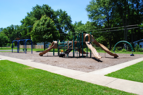 A photo of the playground equipment at Rieth Park on a sunny day.