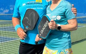 A photo of Goshen Pickleball players with their paddles.