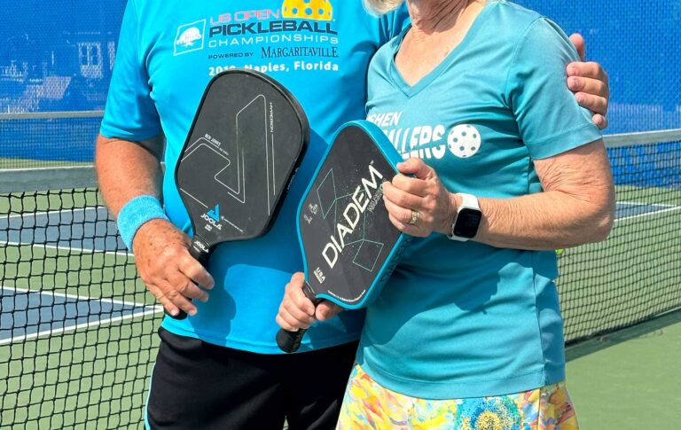 A photo of Goshen Pickleball players with their paddles.