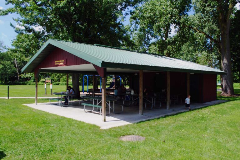 A photo of a family enjoying the shade of Oakridge Pavilion.